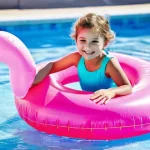 Home 18 어린이를 위한 수영 필수 안전 장비 - **Prompt 1: Playful Fun with Inflatable Ring (Supervised)**
A cheerful Russian child, approximat...